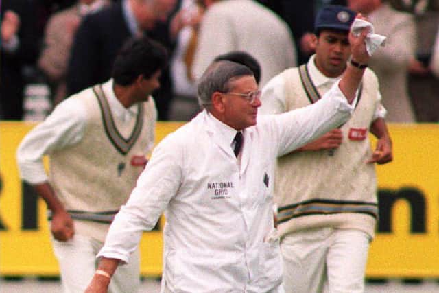 Umpire Harold 'Dickie' Bird (left) acknowledges the crowd's applause after emotional scenes as he stepped onto the Lord's pitch for the opening day of his last Test Match as umpire before his retirement. Picture: Rebecca Naden/PA.