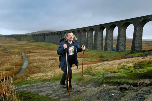 Peter Benefer from Leeds at Ribblehead Viaduct, on a training excersice as he prepares to walk the Yorkshire Three Peaks three times over the weekend of the 28th April to raise money for the Hedgehog Emergency Rescue, Bingley. Picture by Tony Johnson.