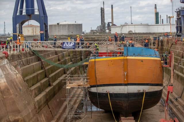 Endeavour in dry dock as work begins on its refit. Picture: Charlotte Graham