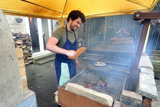 Alisdair Brooke-Taylor cooks over wood outdoors. Picture Tony Johnson.