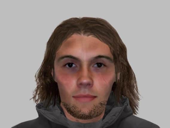Police have released this e-fit of the robber.