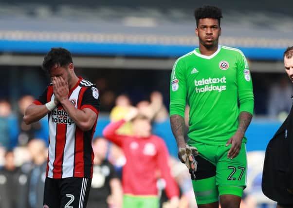 Dejected: Blades duo George Baldock  and Jamal Blackman at the end of the game. Picture: Simon Bellis/Sportimage