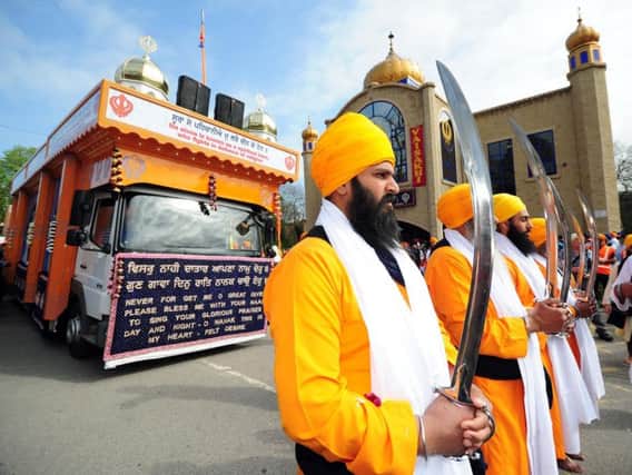 Members at The Sikh Temple in Leeds.