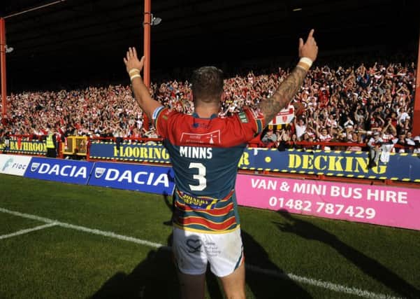 Thomas Minns celebrates being promoted to the Super League with Hull KR.