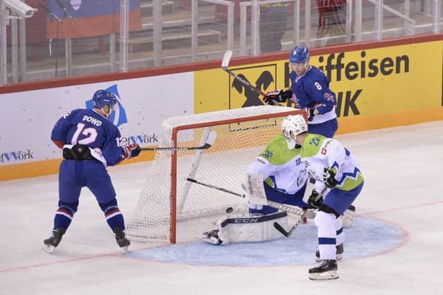 TAKE THAT: Rob Dowd flat-bats the puck into the net to give GB a 2-1 lead. Picture: Dean Woolley.
