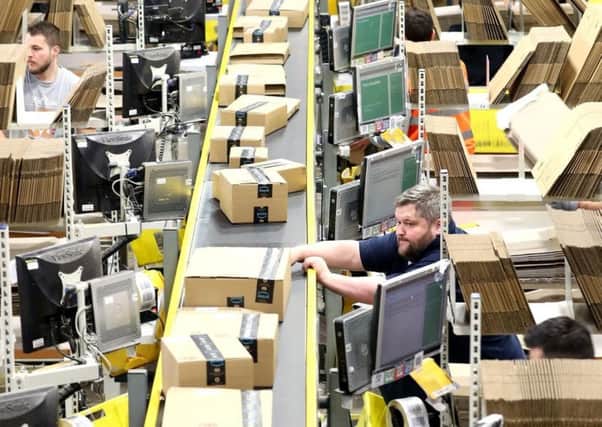 Should online retialers like Amazon face a postcode levy on every transaction?