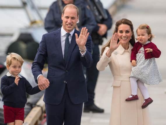 The Duke and Duchess of Cambridge, Prince George and Princess Charlotte
PIC: Dominic Lipinski/PA Wire