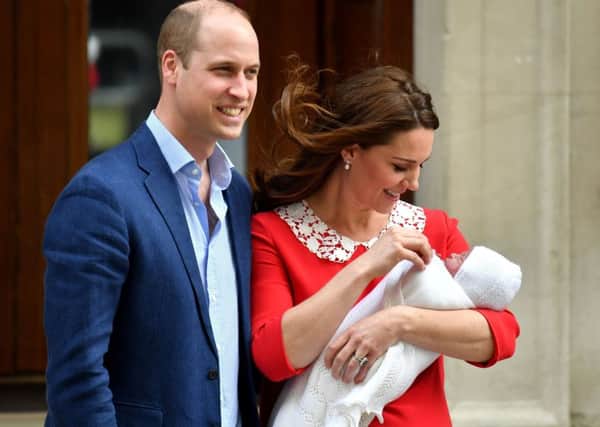 The Duke and Duchess of Cambridge leave hospital with their new-born son who is fifth in line to the throne.