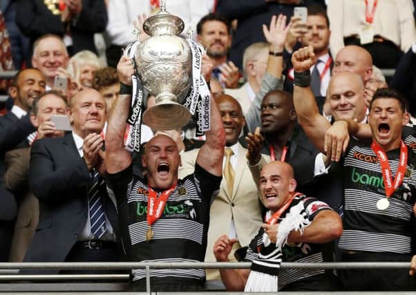 It's ours: Hull FC's Gareth Ellis lifts the trophy at Wembley.