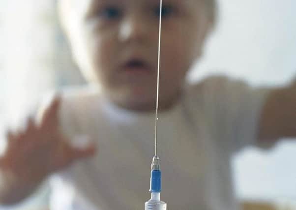 A child getting an immunisation jab. Photo: Posed by model/PA.