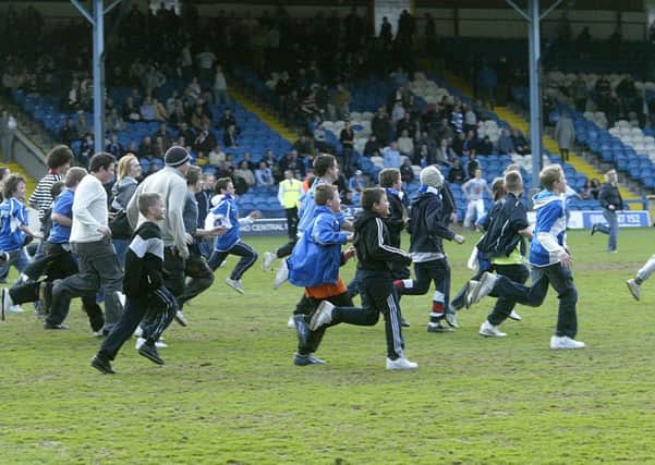 Joy: Halifax fans celebrate what proved a short-lived reprieve.