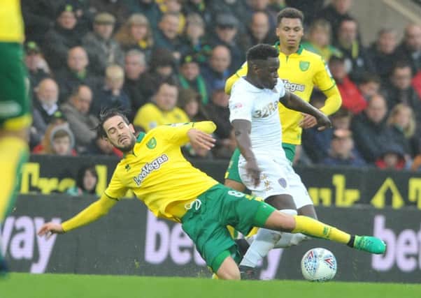 Leeds's Ronaldo Viera is tackled by Canaries' Mario Vrancic. Picture Tony Johnson.