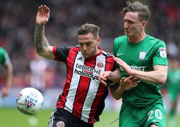 Sheffield United captain Billy Sharp seen, left, in action.
