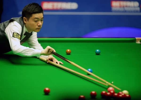 Ding Junhui in action on his way to victory over Anthony McGill at the Crucible, Sheffield (Picture: Richard Sellers/PA Wire).