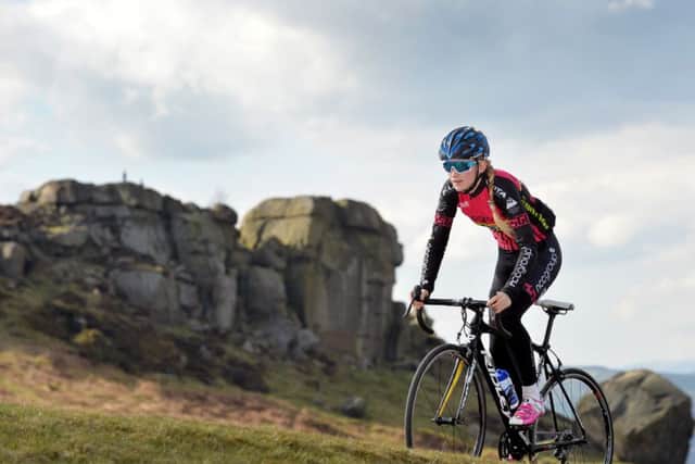 Top climb: Sophie Thackray training up the Cow and Calf.  Picture: Bruce Rollinson