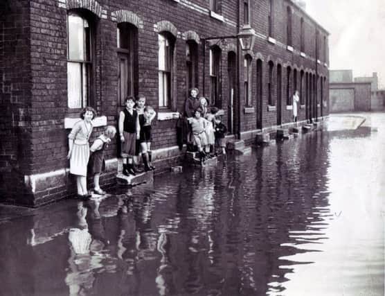 The flooded houses in Surbiton Street, near Broughton Lane in Sheffield 
20th August 1954
