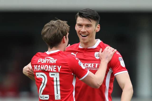 Celebration: Barnsley's Kieffer Moore is congratulated by Connor Mahoney after putting them 1-0 up. Picture: Gordon Clayton
