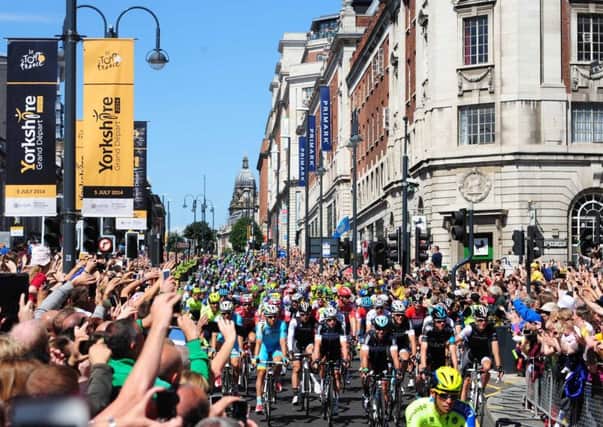 The start of the Tour de France in 2014 when Mark Cavendish and Chris Froome led cyclists through Leeds.