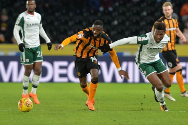 Adama Diomande and Dimitri Cavatre chase the ball during Hull City and Barnsley's february clash. (Picture: Bruce Rollinson)
