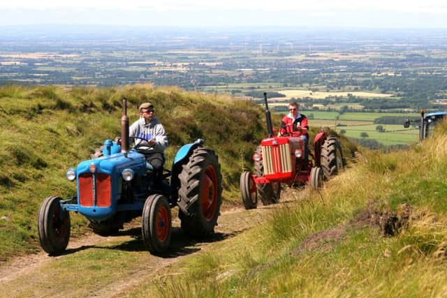 Young Farmers' Clubs raise thousands of pounds for charity every year by holding fundraising events such as tractor runs. Picture by Malcolm Bisby.