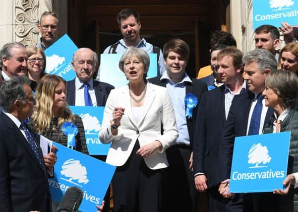 Theresa May meets Tory suppoters in Wandsworth where her party remained power.