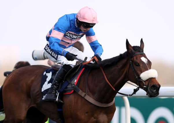 Diego Du Charmil and Harry Cobden wins the Doom Bar Maghull Novices' Chase  at Aintree. Picture: David Davies/PA