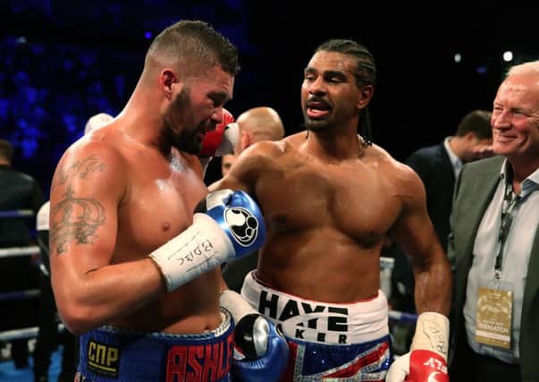 WELL DONE: David Haye, right, congratulates Tony Bellew for winning their heavyweight contest after a fifth-round stoppage. Picture: PA