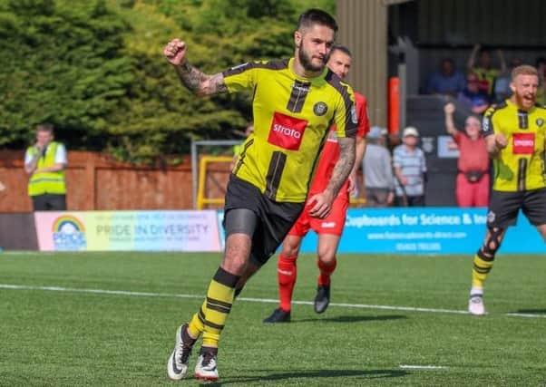 Dominic Knowles celebrates after firing home Harrogate Town's equaliser against Chorley from the penalty spot. Picture: Town Pix