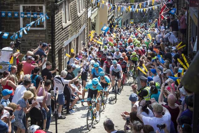 Competitors ride through Haworth during day four of the Tour de Yorkshire from Halifax to Leeds. Picture: Danny Lawson/PA