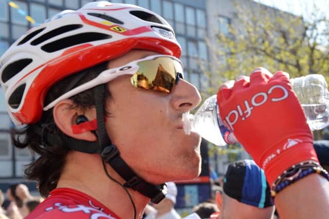 Stage 4 winner Stephan Rossetto takes a well-earned drink at the finish on Leeds' Headrow.  Picture: Bruce Rollinson