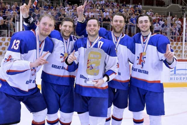 GOLDEN TIME: Sheffield Steelers famous five with the World Championship Division 1A trophy in Budapest (left to right): Davey Phillips, Jonathan Phillips, Robert Dowd, Ben O'Connor and Liam Kirk. Picture: Dean Woolley.