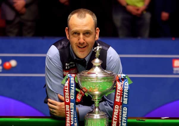 Mark Williams with the trophy after winning the 2018 Betfred World Championship at The Crucible, Sheffield. Picture: Richard Sellers/PA