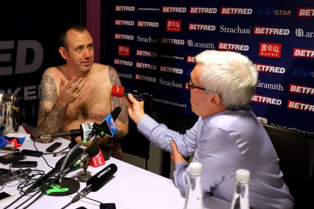 Mark Williams conducts his post match interview without any clothes after winning the  World Championship at the Crucible, Sheffield. He had said earlier in the tournament that he would do the interview naked if he won the title (Picture: Richard Sellers/PA Wire).
