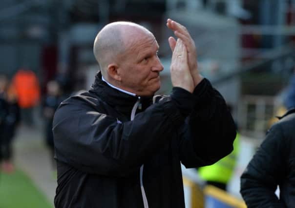 Simon Grayson, seen applauding Bradford City supporters at last months home game with Portsmouth, has decided not to take up the offer of a two-year contract at Valley Parade. He had replaced Stuart McCall in February on a short-term basis (Picture: Bruce Rollinson).