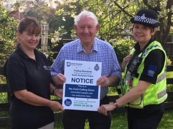 Left to right, Sharon Edwards, of Trading Standards, resident Michael Bell and PCSO Tracy Brown
