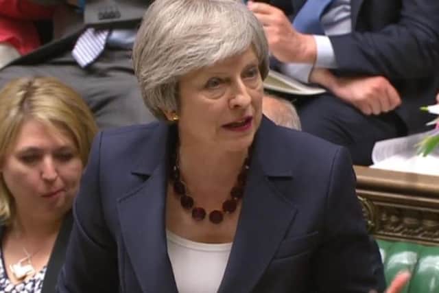 Prime Minister Theresa May defended her Transport Secretary Chris Grayling under fire from Halifax MP Holly Lynch.