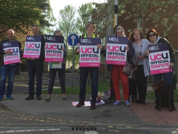 Max Beckmann, pictured centre, with striking staff outside Harrogate College