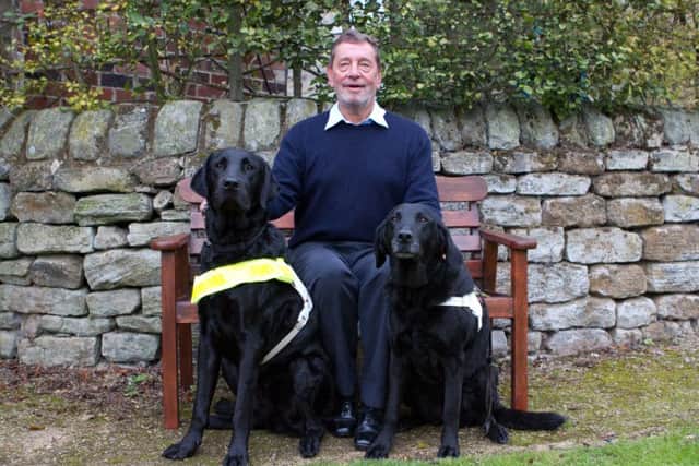 GUIDED LIGHTS: Lord Blunkett with two of his former guide dogs, Sadie and Cosby.  Following Cosbys death, he was reminded of the challenges facing people with disabilities while he awaited his new dog, Barley.