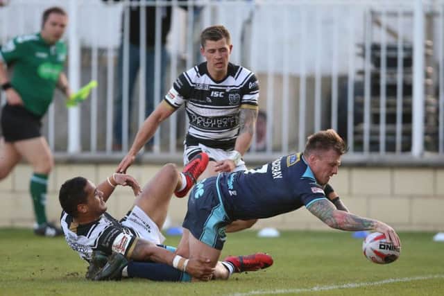 Featherstone Rovers' Anthony Thackeray scores his side's opening try of the game against Hull FC.