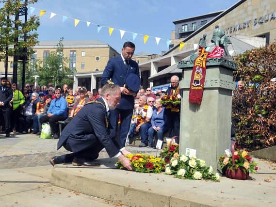 ONE YEAR AGO: Lord Mayor of Bradford coun Geoff Reid lays a wreath at a memorial service in Centenary Square Bradford on the 32nd anniversary of the Bradford City fire at Valley Parade. Picture Tony Johnson.