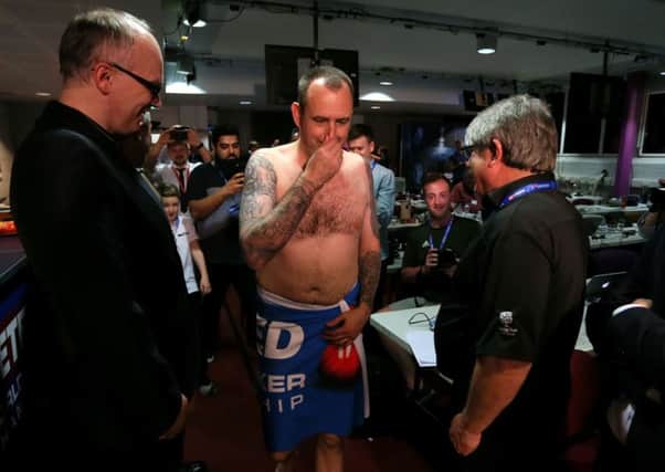Mark Williams walks to his post match interview without any clothes on after winning the 2018 World Championshipat The Crucible. Picture: Richard Sellers/PA