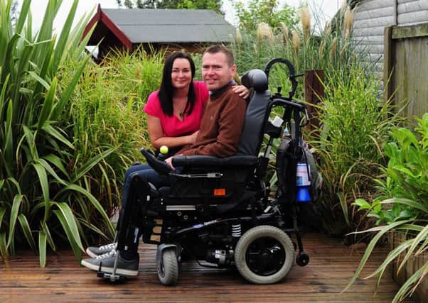 Jason Liversidge with his wife Liz, at their home at Rise, near Hull. Picture by Simon Hulme