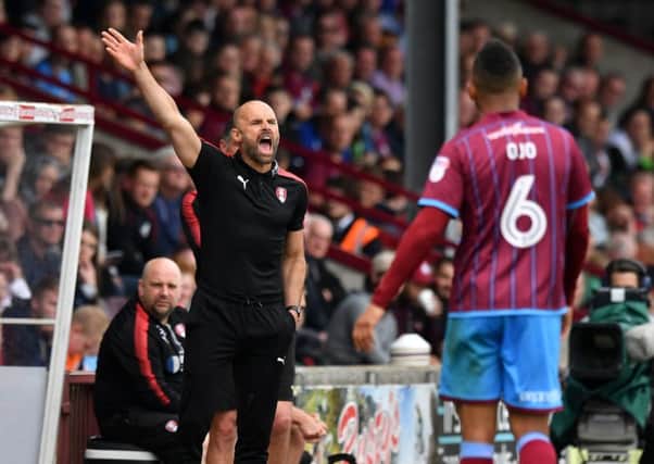 Rotherham United manager Paul Warne gestures on the touchline at Glanford Park. Picture: Anthony Devlin/PA