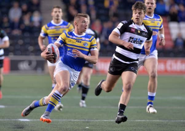 Jack Walker on the attack for Leeds Rhinos against 
Widnes Vikings on Friday (Picture: Bruce Rollinson).