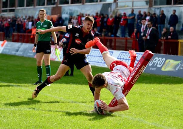 Hull KR's Elliot Wallis dives for the line to score a try, but it was not awarded. Picture: James Hardisty.