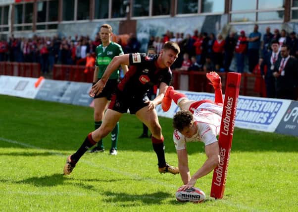 Elliot Wallis, of Hull Kingston Rovers, dives for the line to score a try, but it was ruled out.