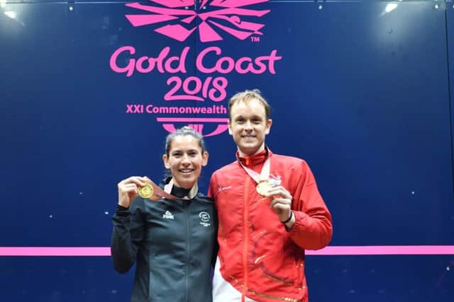 James Willstrop poses with fellow Commonwealth Games gold medallist Joelle King. Picture: World Squash Federation/Toni Van der Kreek