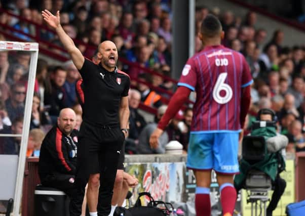 Rotherham United manager Paul Warne gestures on the touchline during the League One play-off semi-final first leg at Glanford Park (Picture: Anthony Devlin/PA Wire).