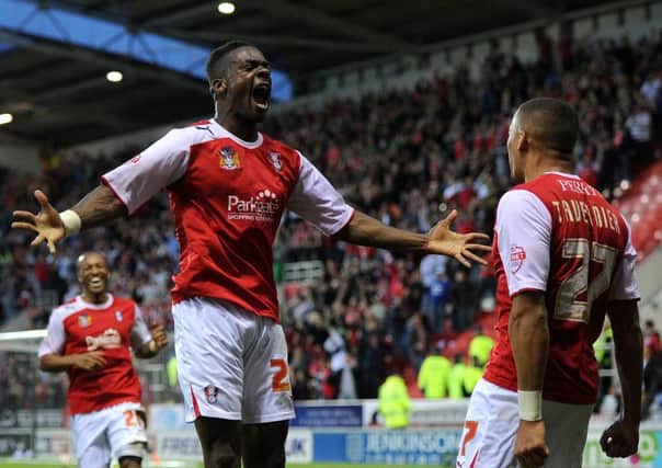 Action replay required: Rotherham United's Kieran Agard celebrates scoring the third goal during the League One play-off semi-final win over Preston in 2014.