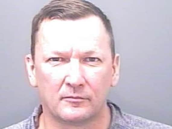 Nigel Fox was jailed for a year for setting up fake insurance policies.